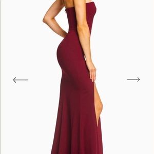 Brand new Dress The Population strapless burgundy gown with a slit on the leg.